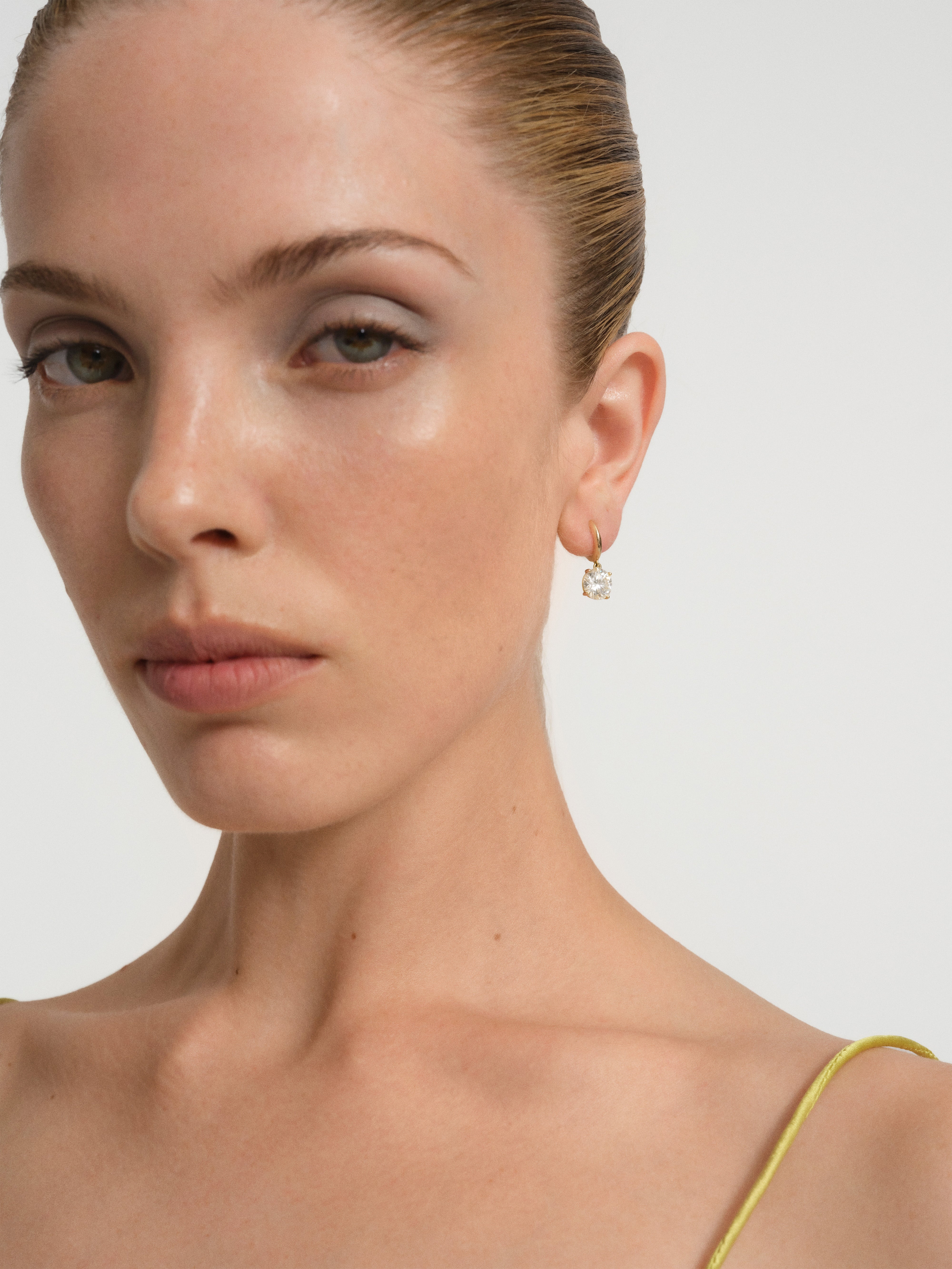 Orbit Solitaire Huggie Earrings in Gold